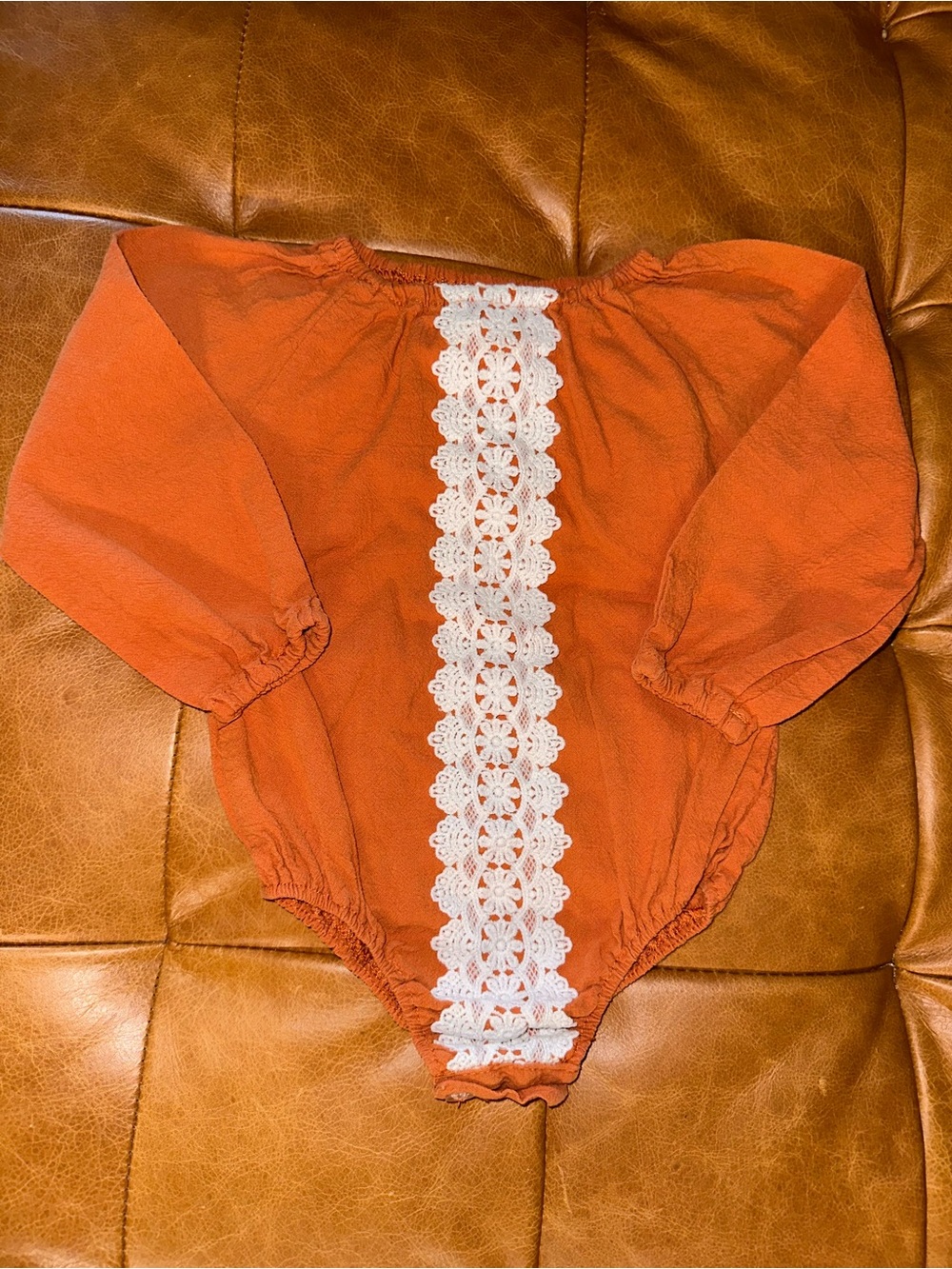 Girls Orange Long-Sleeve One-Piece with White Crochet Trim